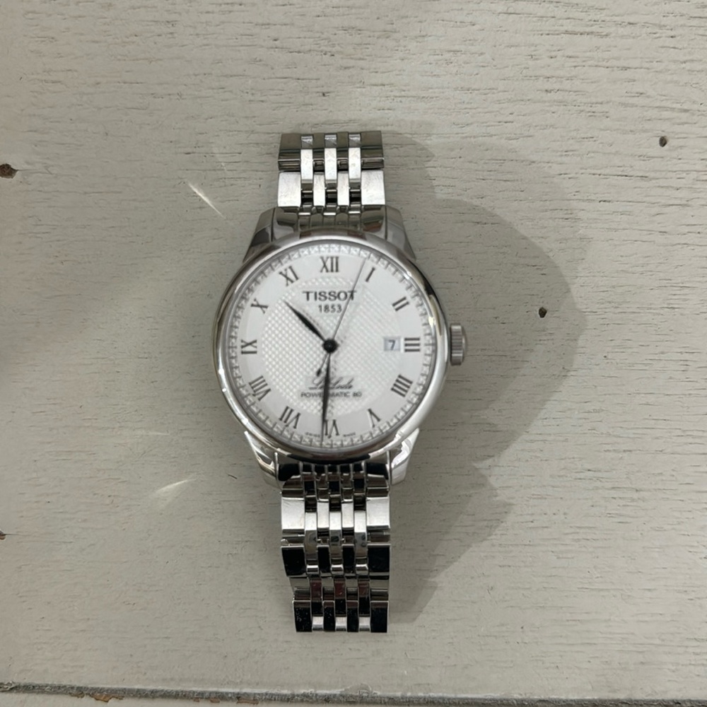 Tissot Silver Watch with White Dial